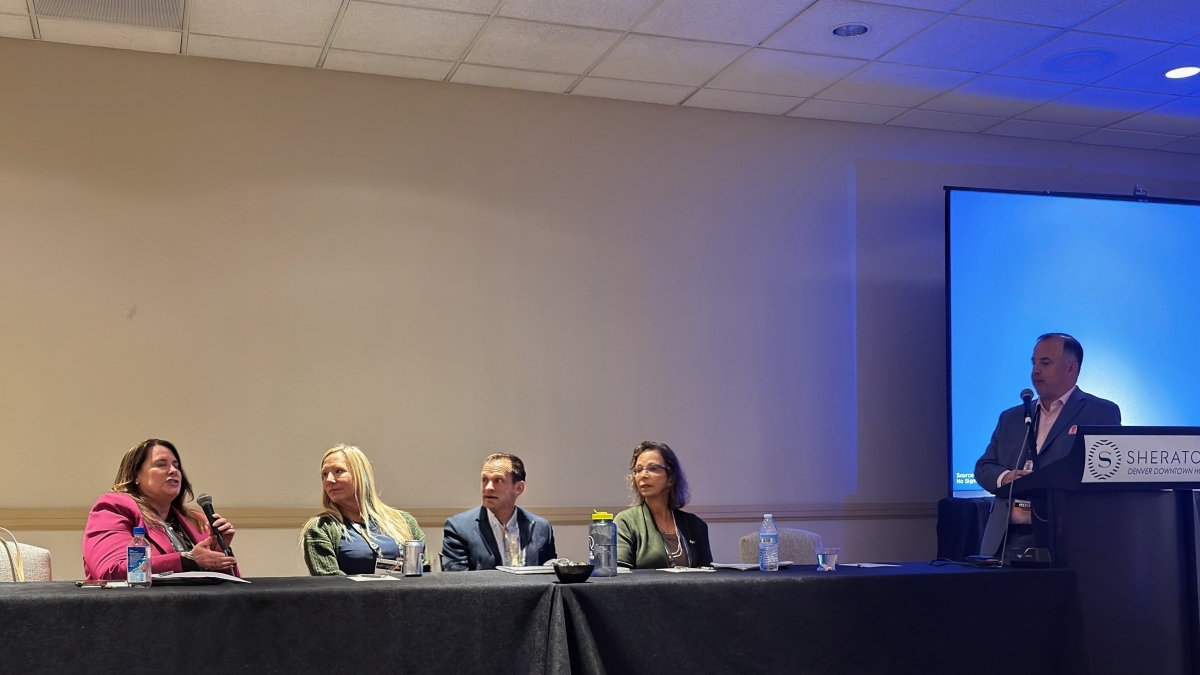 Mark Trahan sitting at panelist table 2
