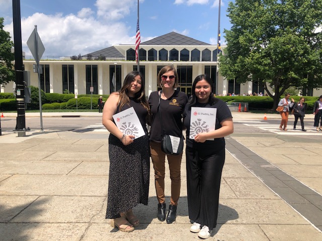 Sarah Donovan Standing with Students Photo